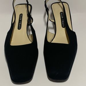 Vintage Ellen Tracy 
Gently used condition  Color:Black Satin Size:9B